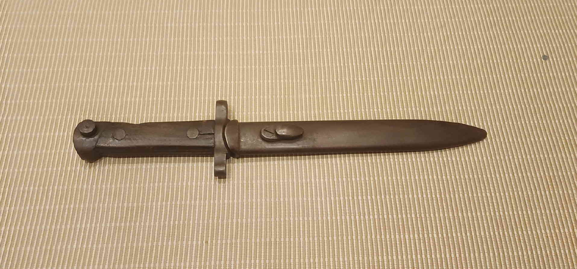 M1938 bayonet with its steel scabbard