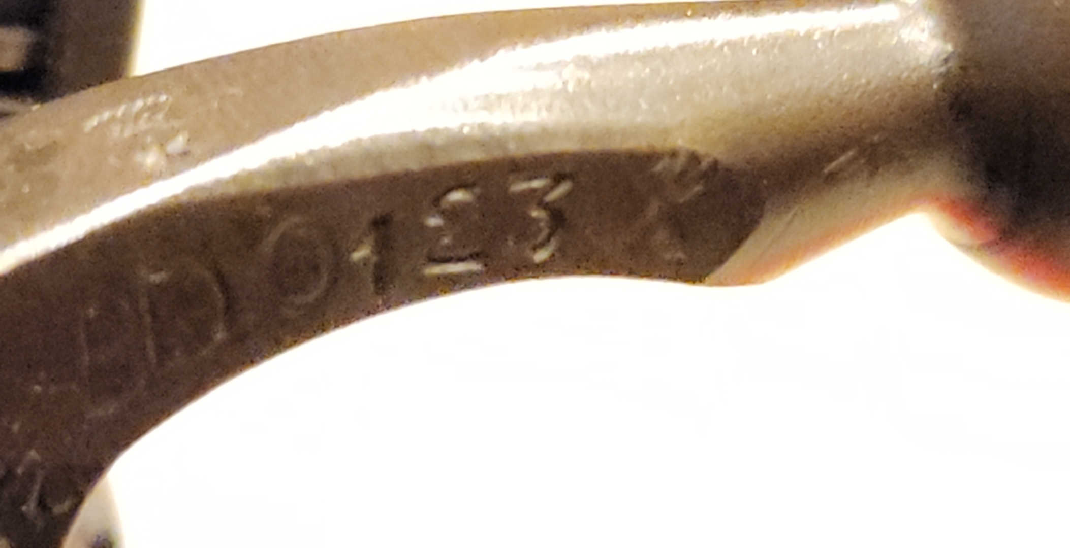 Matching serial BE0123 on the bolt handle root