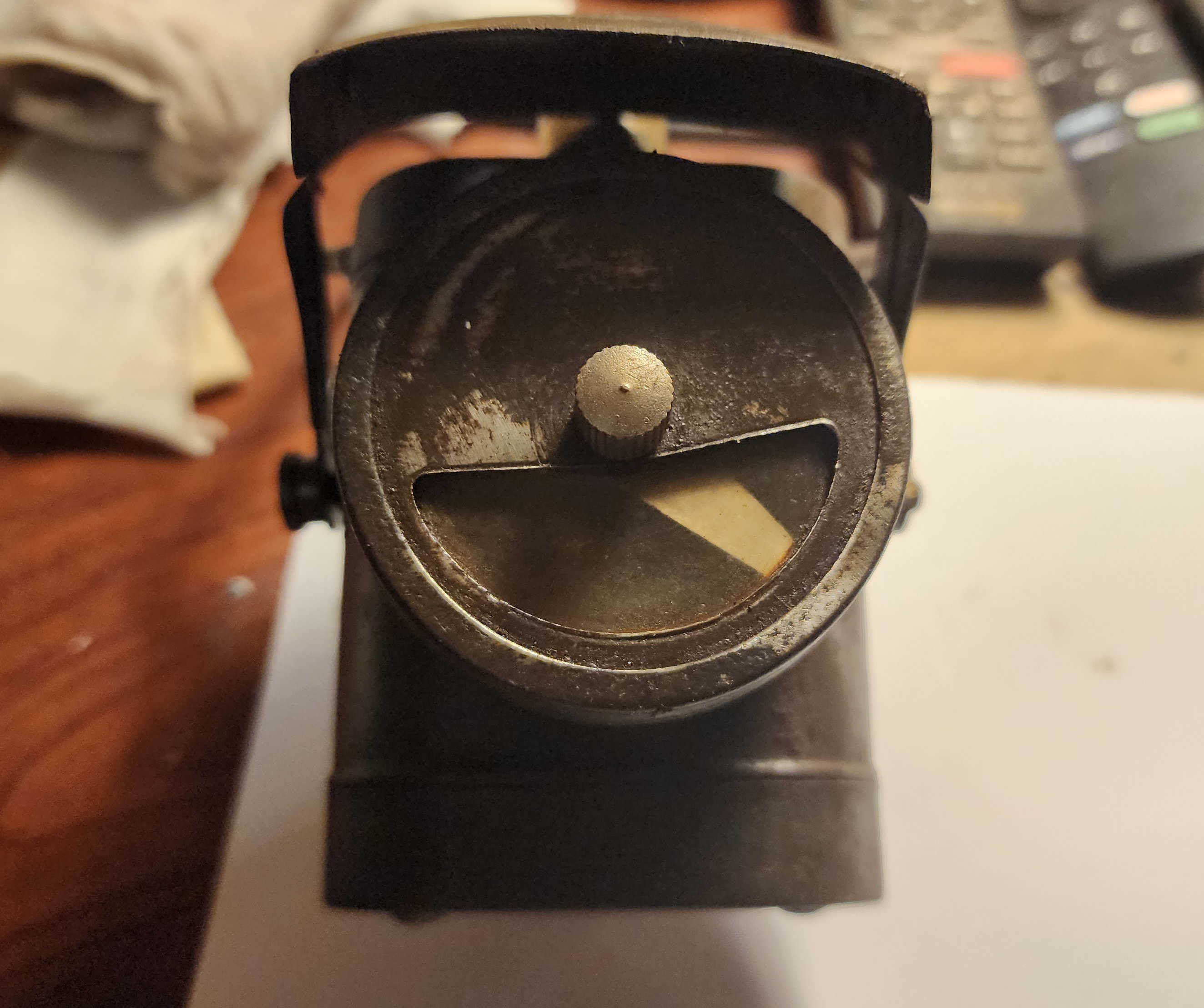 Blackout lamp before restoration, front view with hood open and dimmer visible