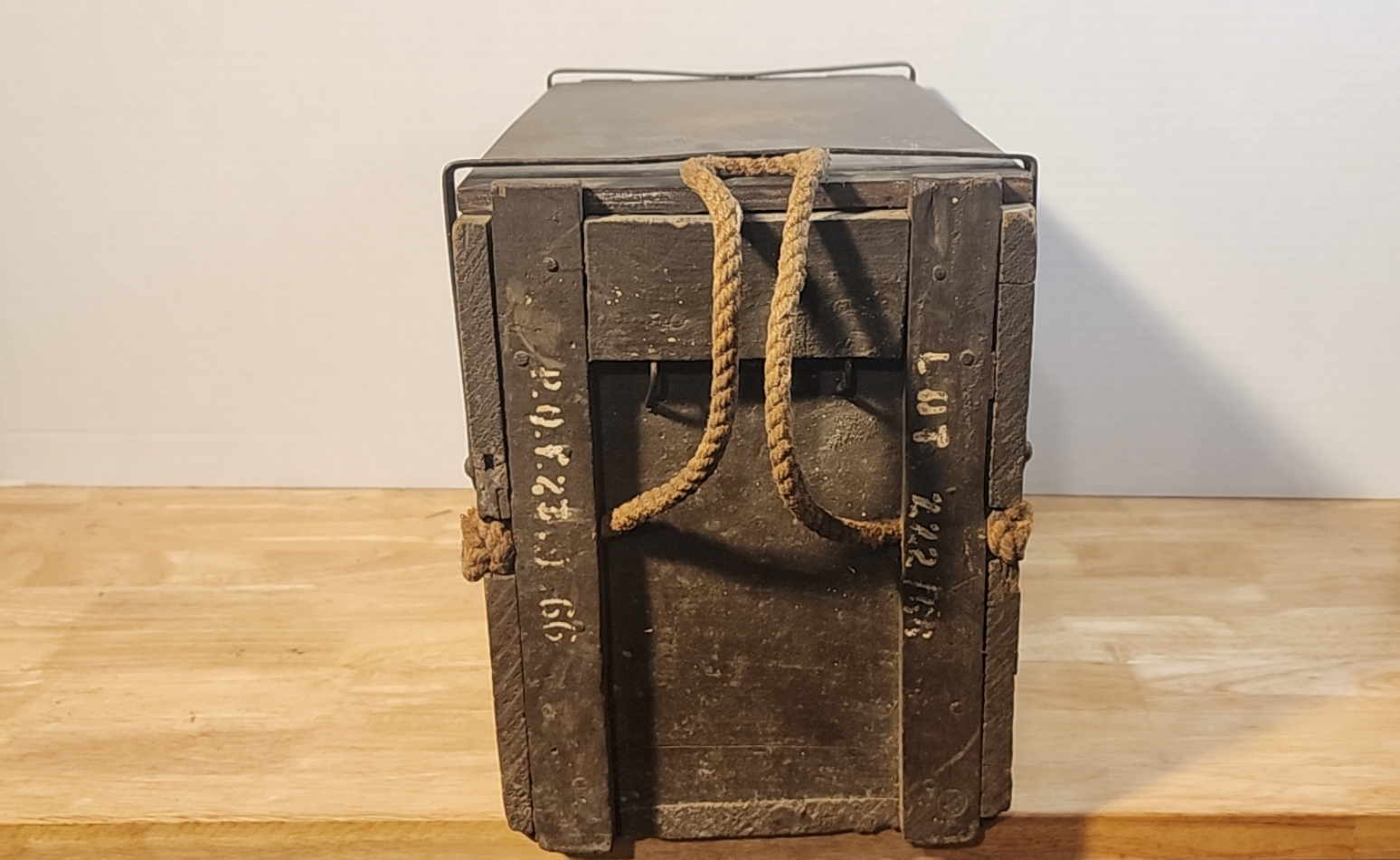 Side view showing rope handle and lot/date markings