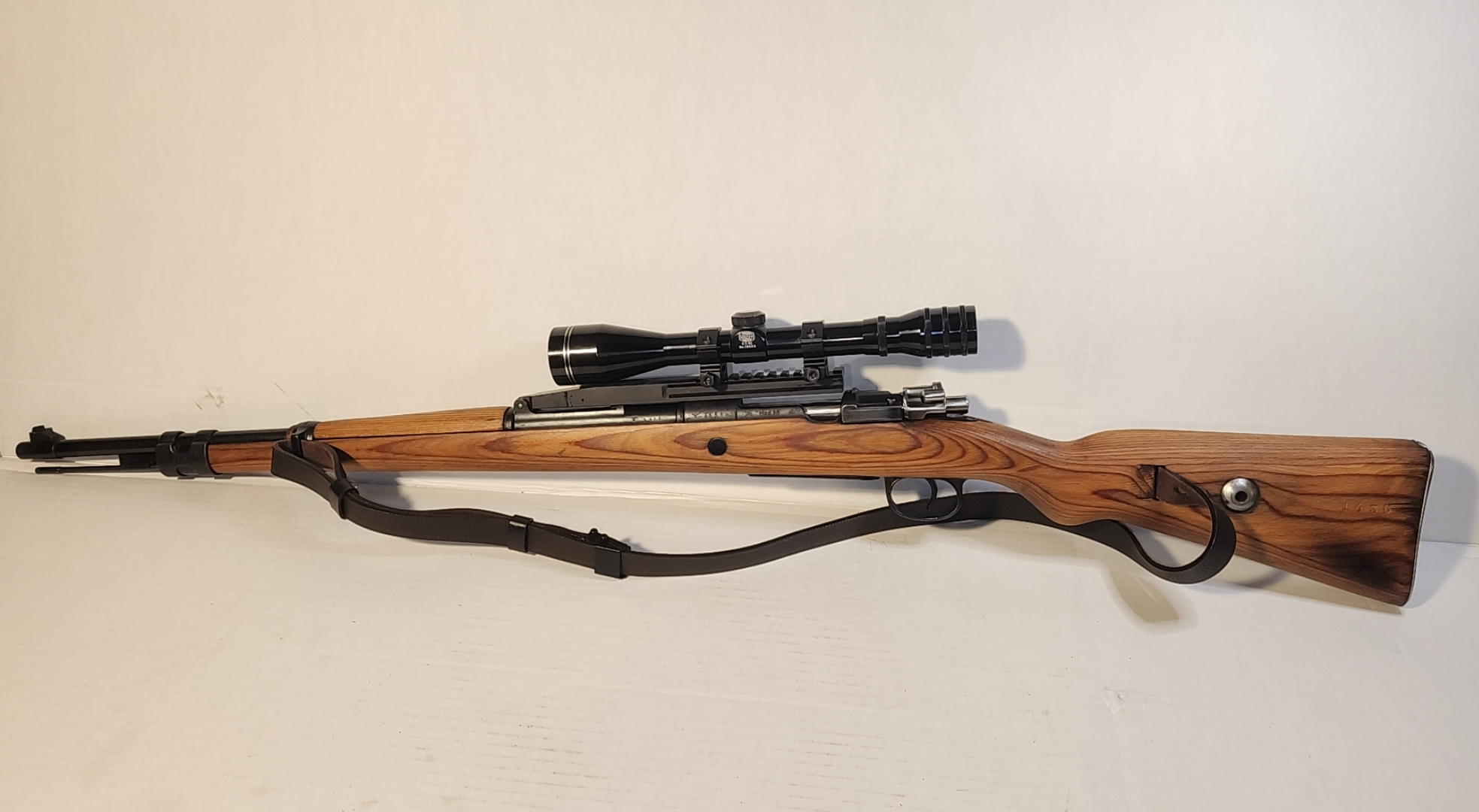 Overall right-side view of the Mauser K98k (code 42, 1940) with sling and post-war “Mauser” 4×40 scope
