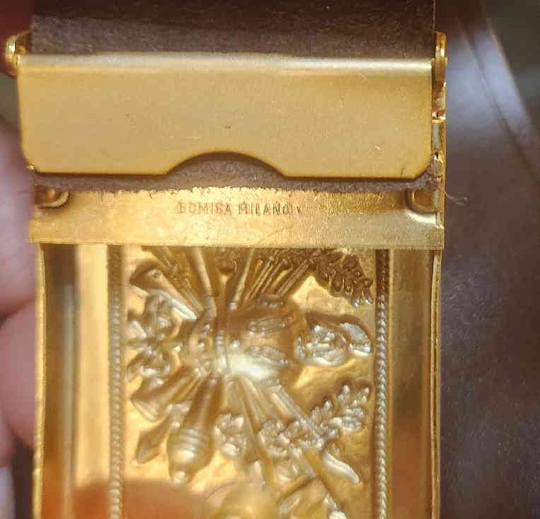 Rear of brass buckle showing BOMISA MILANO maker’s mark