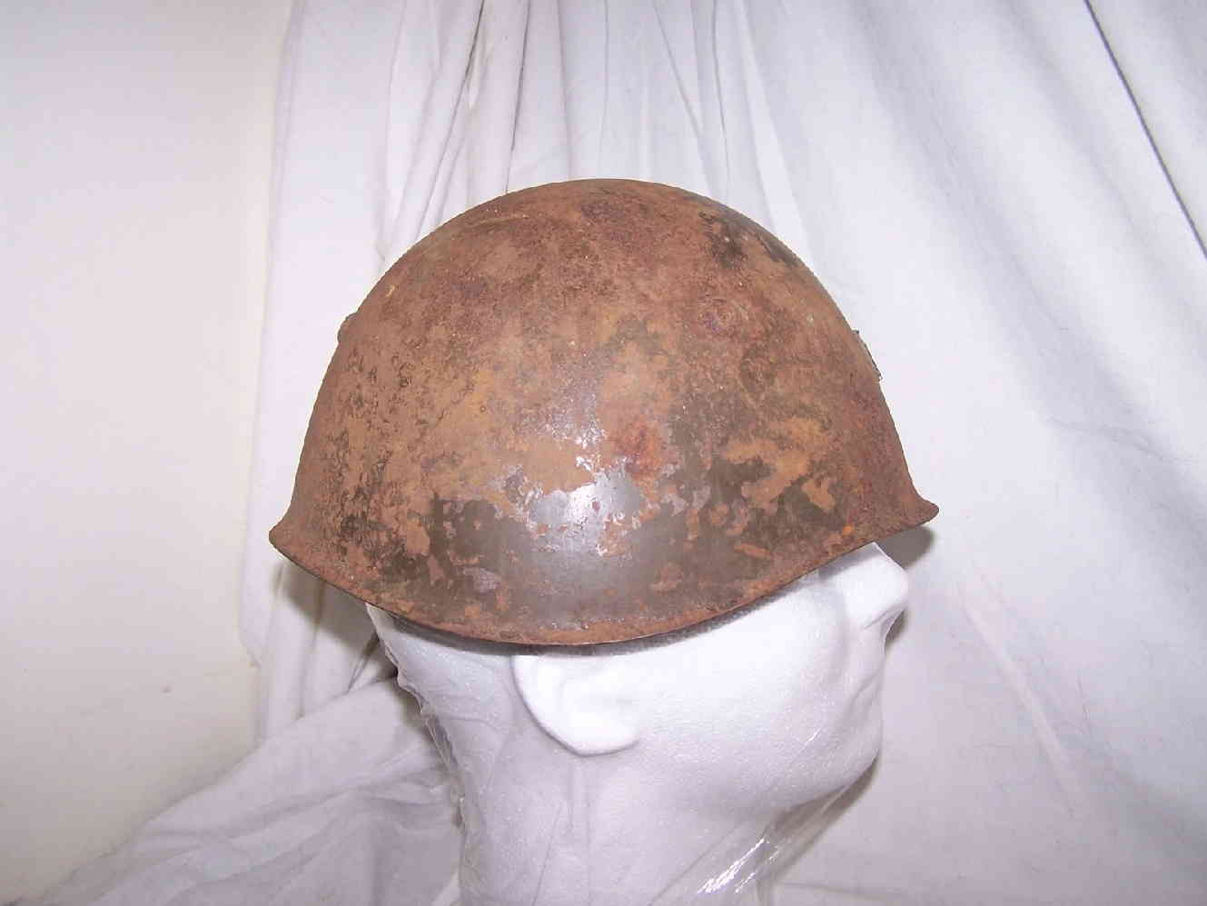 Left side of Italian M33 helmet