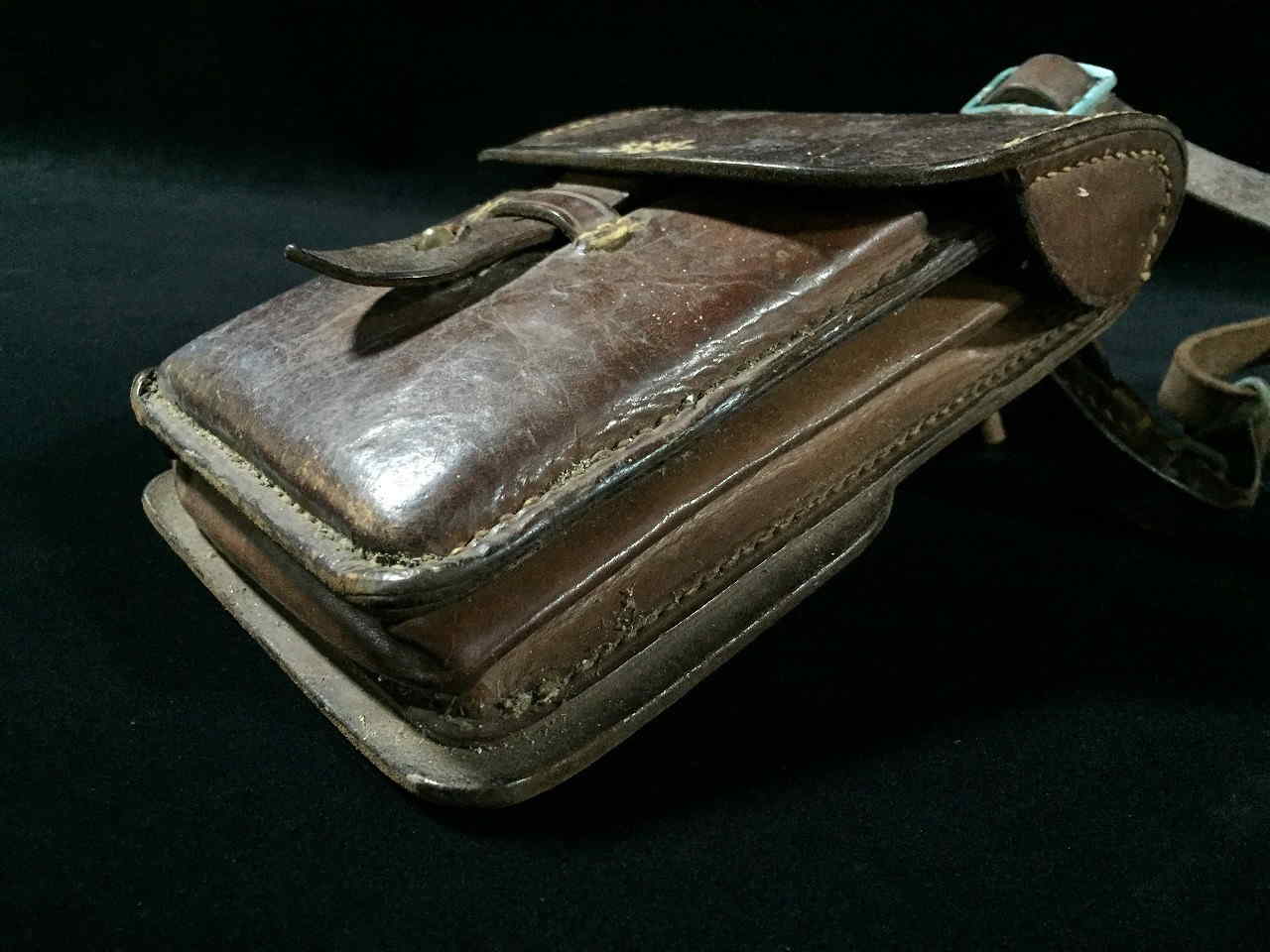 Side view of Imperial Japanese Army leather map or dispatch case showing gusseted construction