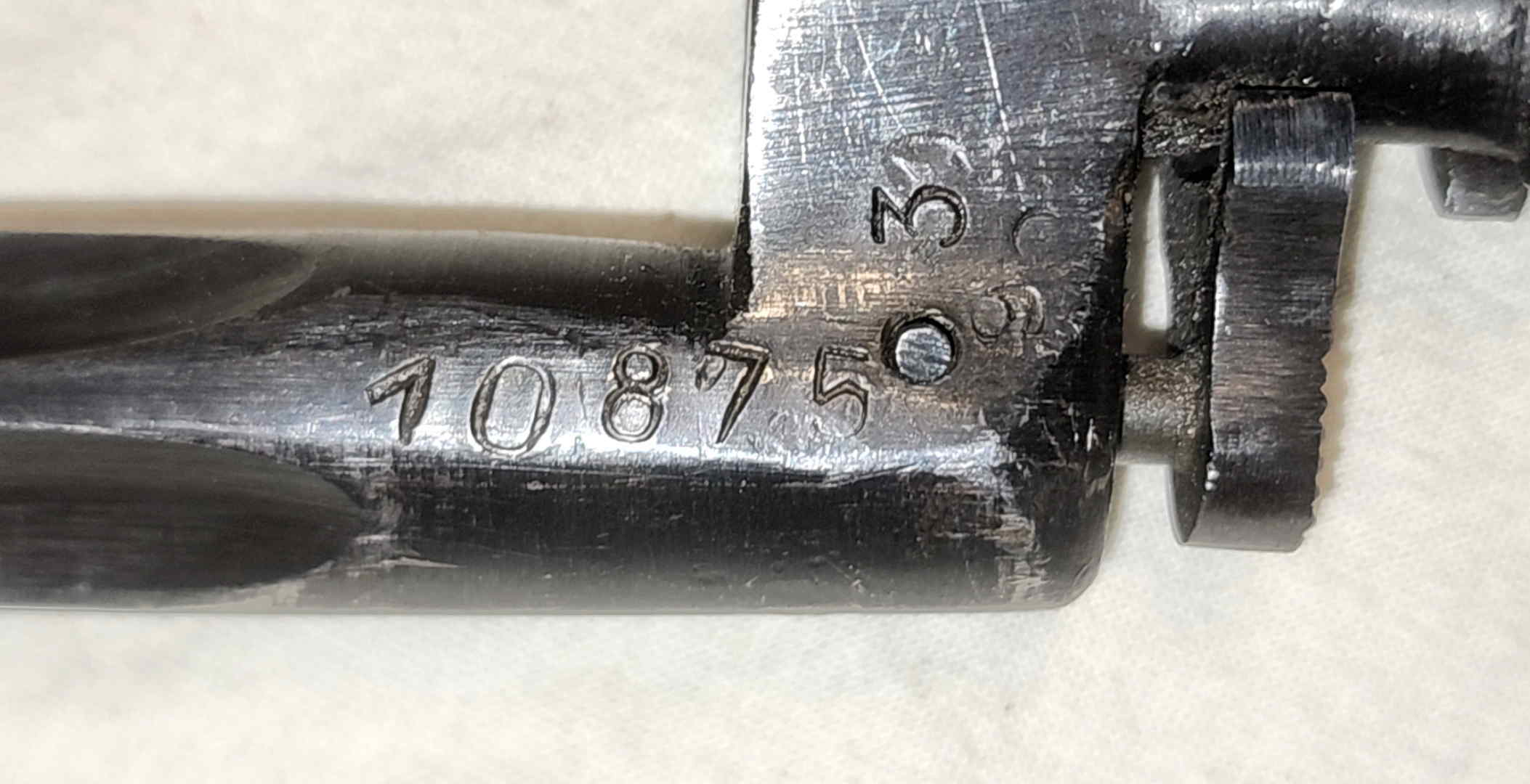 Serial number 10875 on the socket area of the Mosin-Nagant M1891/30 bayonet