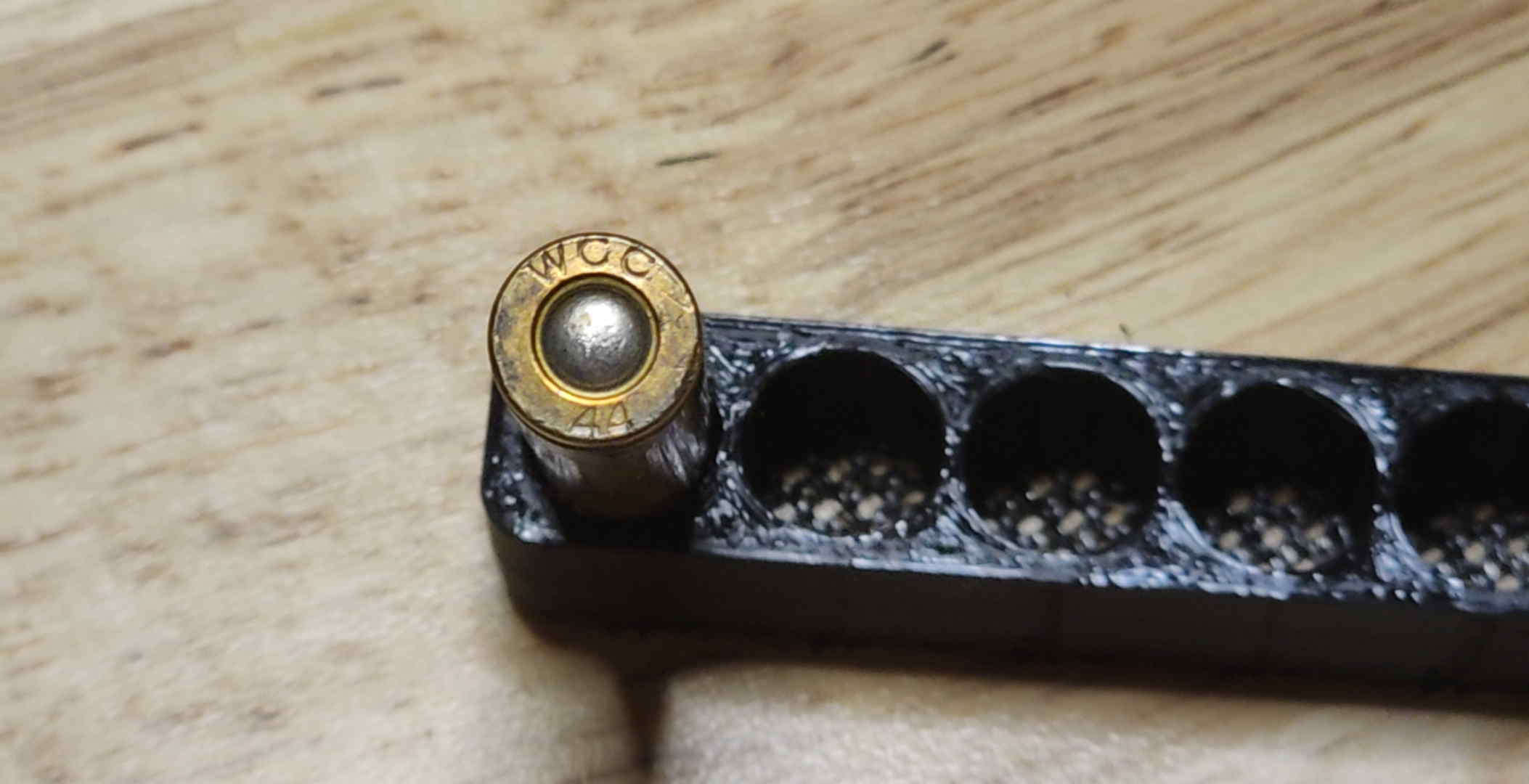 WCC 44 headstamp on a brass-cased .30 Carbine cartridge