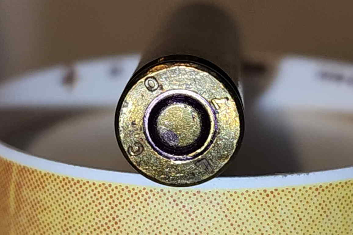 LC 70 headstamp close-up on 5.56mm M193 cartridge
