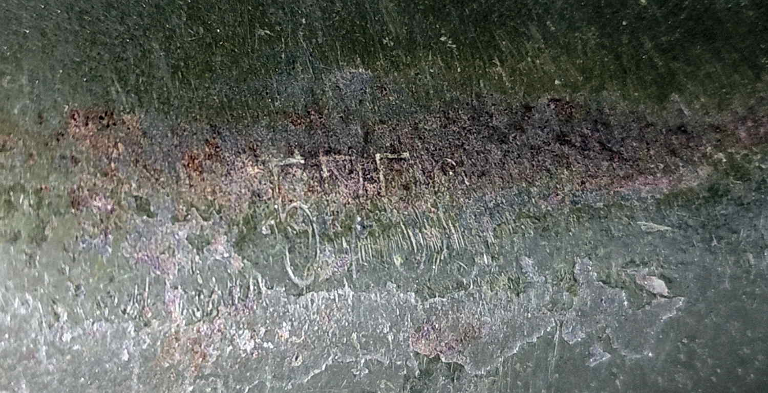 Heat lot stamp 575C on the steel pot inside brim area